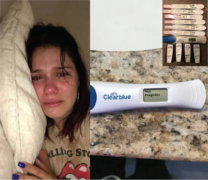 A woman looking at a negative pregnancy test